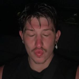 Tallcagedboy